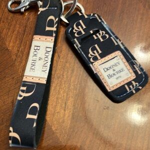 DOONEY & BOURKE SET. KEY CHAIN AND LIP BALM HOLDER. I’LL ADD NEW LIP BALM. EUC